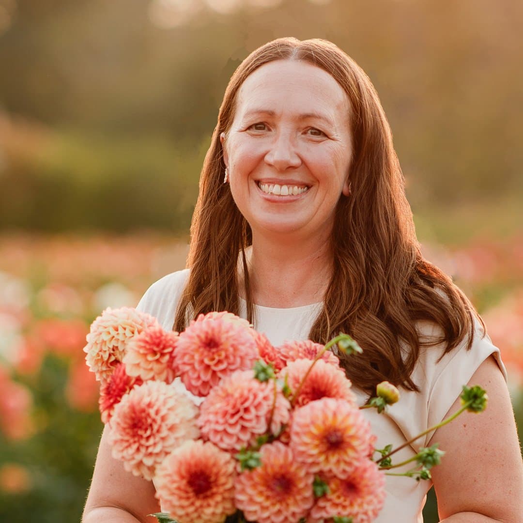 Founder, Beckie Curtis with Dahlias